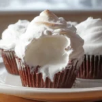 Marshmallow fluff cupcakes with toasted marshmallow frosting on a modern plate