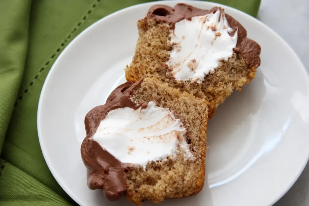 Cinnamon Graham S’more Cupcakes for a Cozy Indoor Treat 6 Cinnamon Graham S’more Cupcakes served with graham crackers and marshmallows