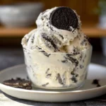 No Churn Cookies and Cream Ice Cream served on a ceramic plate in a cozy home kitchen