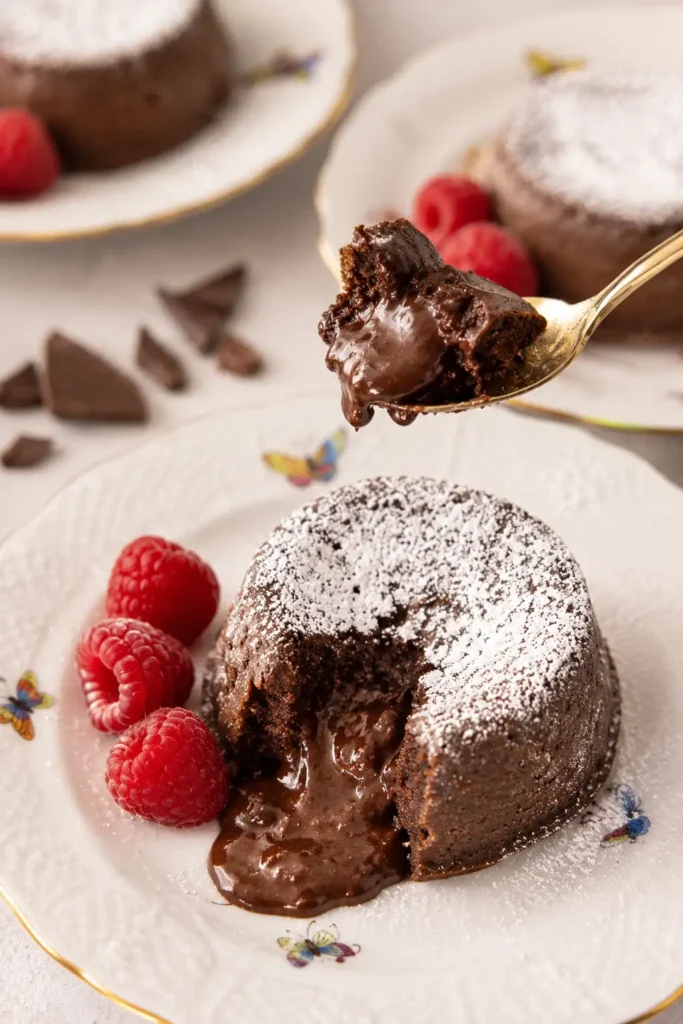 Chocolate Lava Cake with a Soft Molten Center 8 Chocolate lava cake with molten center and a spoonful of warm chocolate