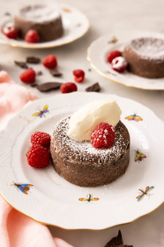 Chocolate Lava Cake with a Soft Molten Center 10 Chocolate lava cake served with berries and vanilla cream