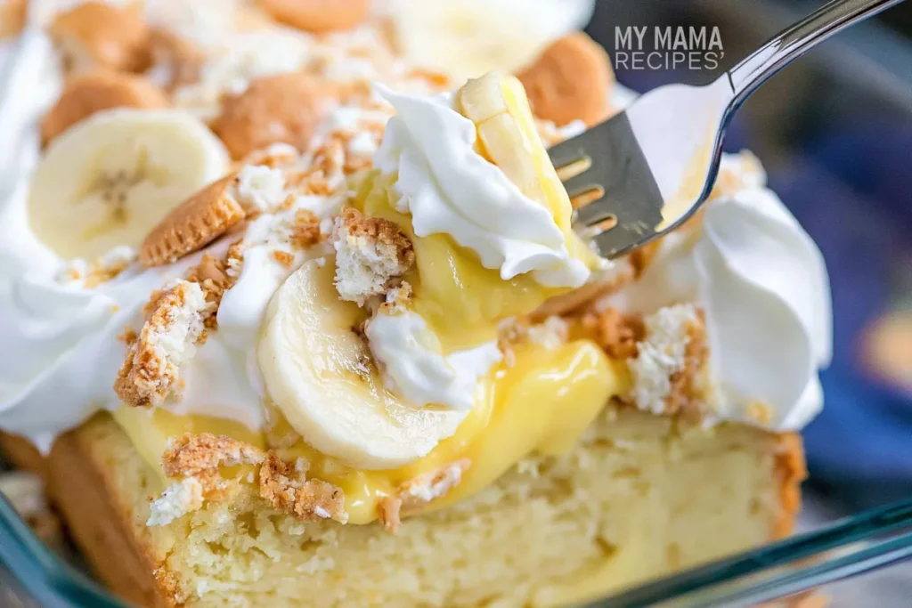 Banana pudding poke cake close-up with whipped topping bananas and wafers