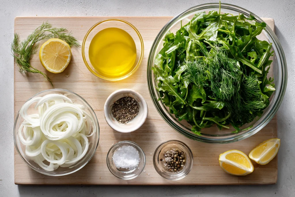 Ingredients for dandelion salad recipe arranged overhead in glass bowls