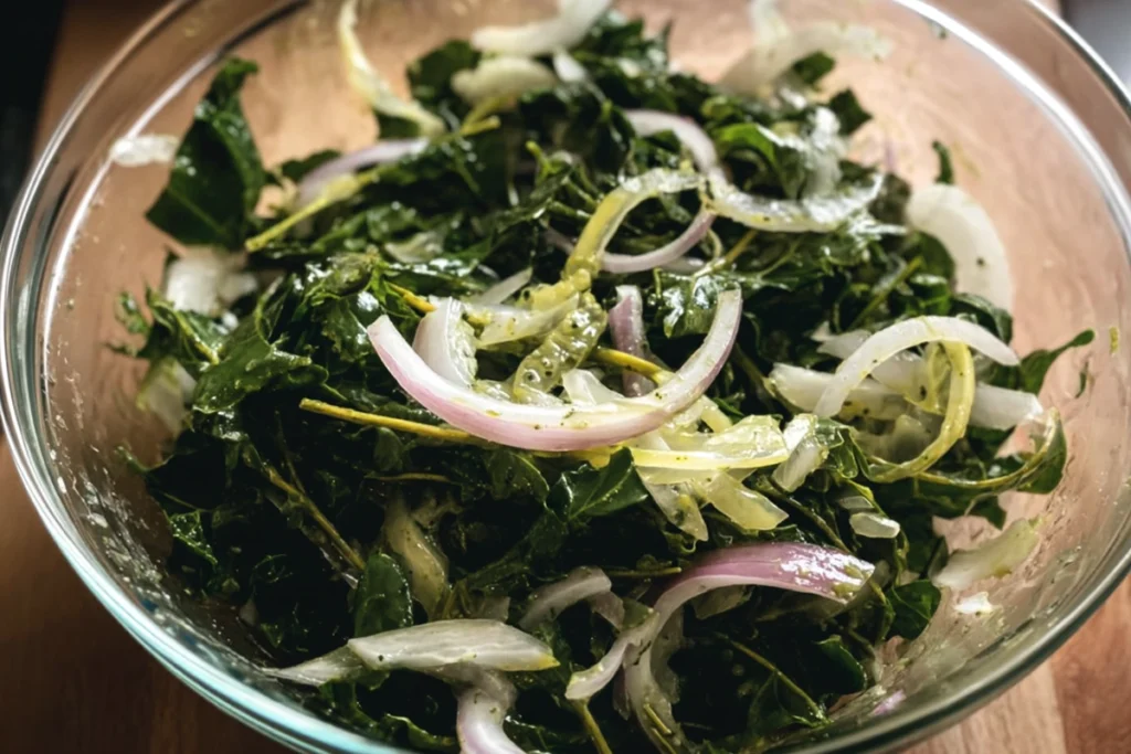 Dressing greens for a dandelion salad recipe with olive oil and lemon