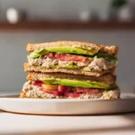 joe the juice tuna sandwich served on toasted sourdough with avocado and pesto