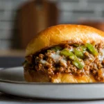 Philly cheese steak sloppy joes served warm on toasted brioche buns