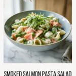 Creamy smoked salmon pasta salad with fresh herbs and vegetables