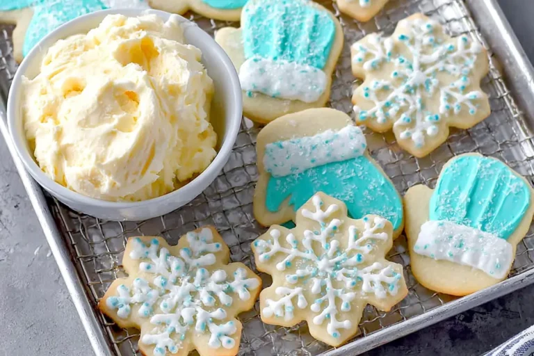 decorated sugar cookies with smooth sugar cookie frosting in a home kitchen setting