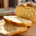 perfect quinoa bread sliced and freshly baked on a modern ceramic plate