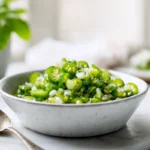 Homemade Jalapeño Relish Recipe: A Flavor-Packed Condiment You’ll Always Want in Your Fridge 7 Bright, close-up photo of jalapeño relish in a bowl on a modern kitchen counter, showing glossy green texture under natural daylight.