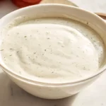 Copycat Hidden Valley Ranch Dressing served fresh in a white ceramic bowl
