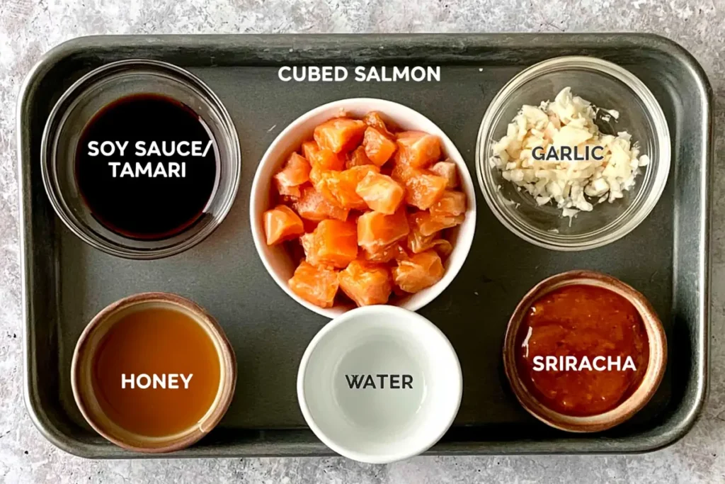 Honey Sriracha Salmon Bowls for a Quick Weeknight Dinner 2 Ingredients for Honey Sriracha Salmon Bowls with cubed salmon, honey, soy sauce, garlic, and sriracha