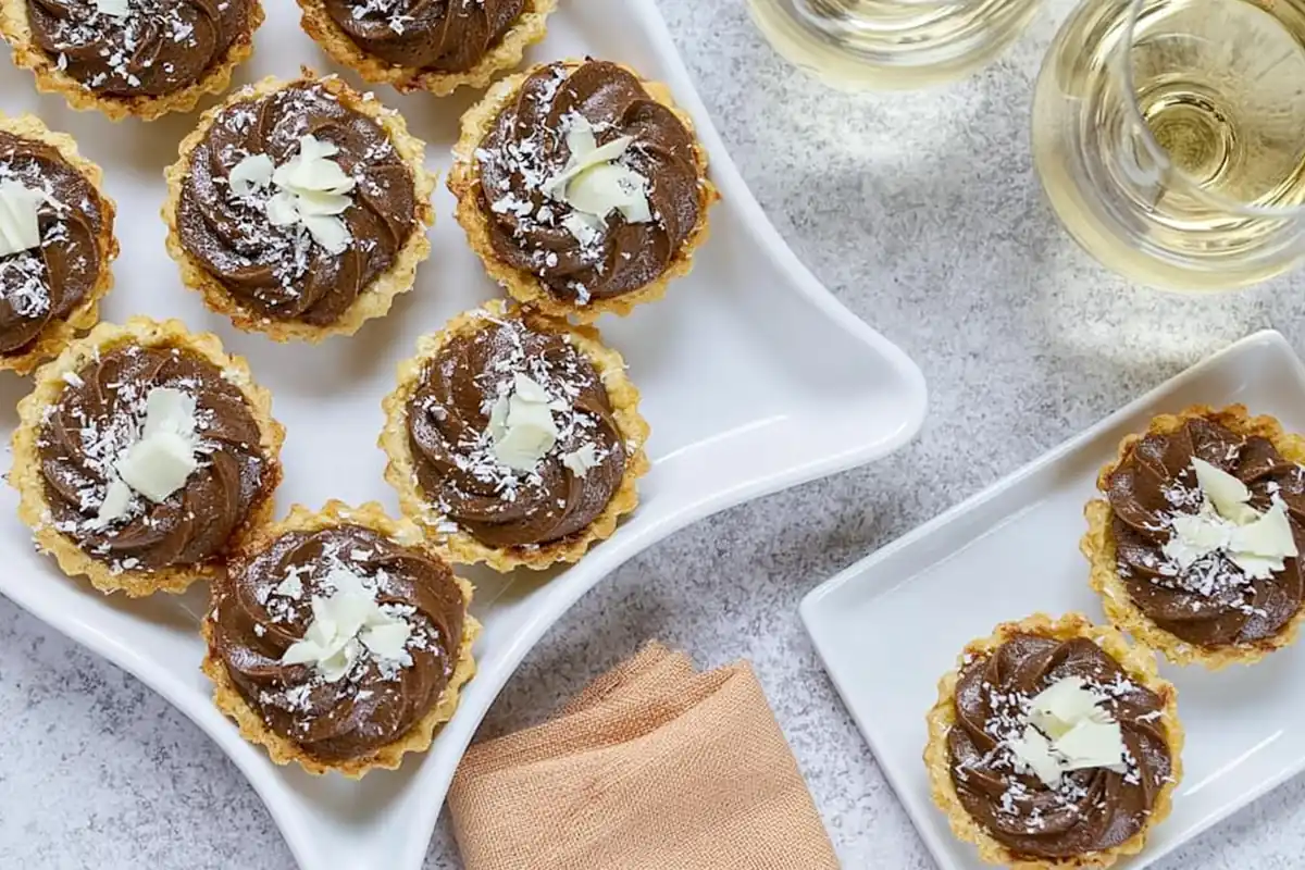 Mini Chocolate Mousse Cups for an Easy No-Bake Dessert 1 Mohamed Ayad's Mini Chocolate Mousse Cups Recipe served in crispy phyllo shells with shaved white chocolate
