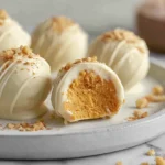 No Bake Pumpkin Cheesecake Balls: A Creamy Fall Treat You’ll Crave 7 close-up of no bake pumpkin cheesecake balls on modern plate in daylight kitchen