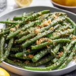 Parmesan Roasted Green Beans: The Crispy, Flavor-Packed Side Dish You’ll Crave 7 Parmesan roasted green beans on a white plate in bright natural kitchen lighting