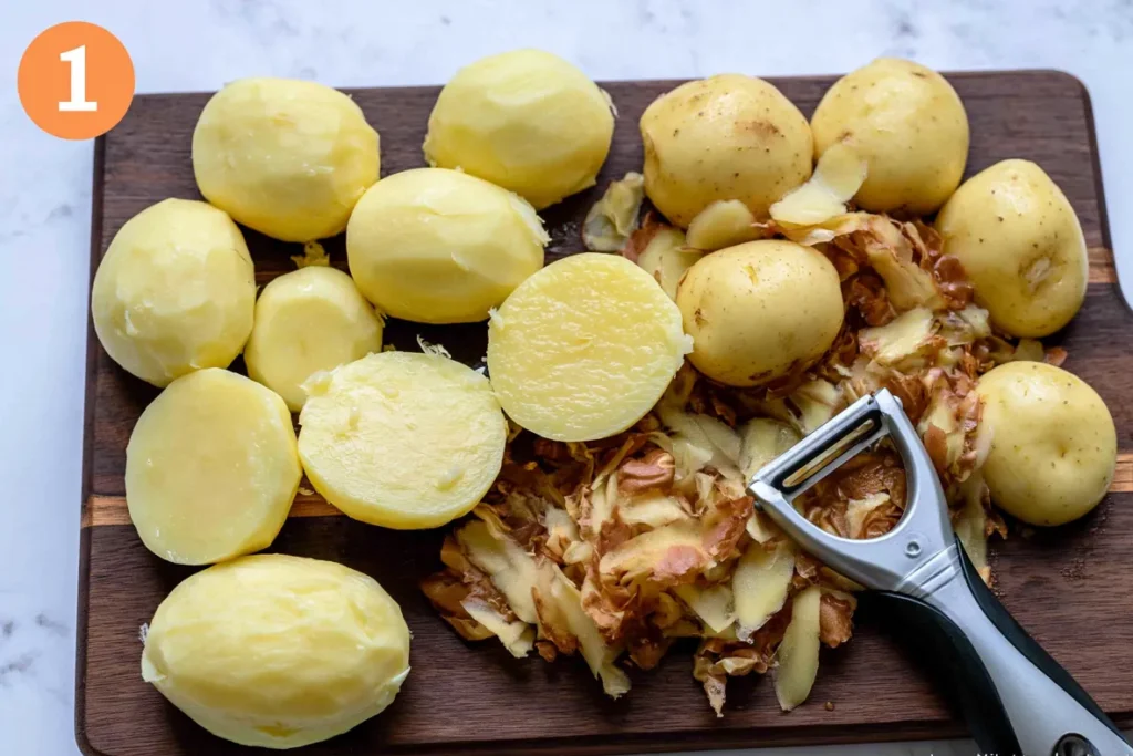 Rosemary Infused Roast Potatoes with Golden Crispy Edges 3 Peeled and evenly cut potatoes for rosemary infused roast potatoes