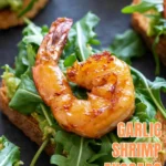 Garlic Shrimp Avocado Crostini recipe with toasted baguette, creamy avocado, arugula, and shrimp