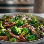 photorealistic beef and broccoli served in modern kitchen with natural light