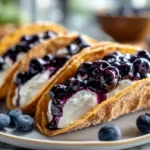 photorealistic blueberry cheesecake tacos on modern kitchen counter
