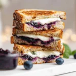 photorealistic blueberry grilled cheese hero image on modern kitchen counter