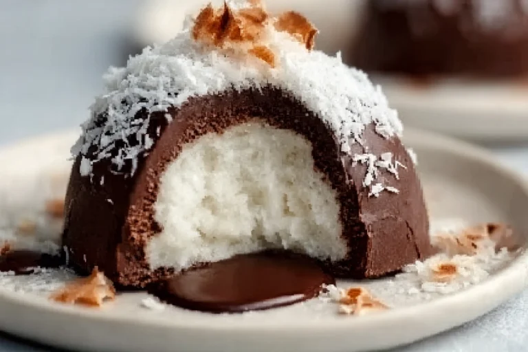 Finished Coconut Dome dessert on a plate in a modern kitchen