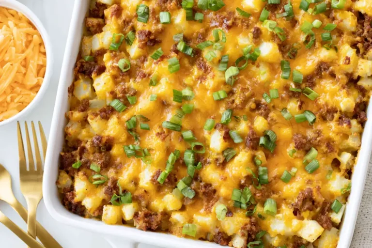 Mohamed Ayad's Comforting Potato and Egg Casserole Recipe with sausage, hash browns, and melted cheddar