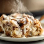 plated Crock Pot Cinnamon Roll Casserole on a modern kitchen counter