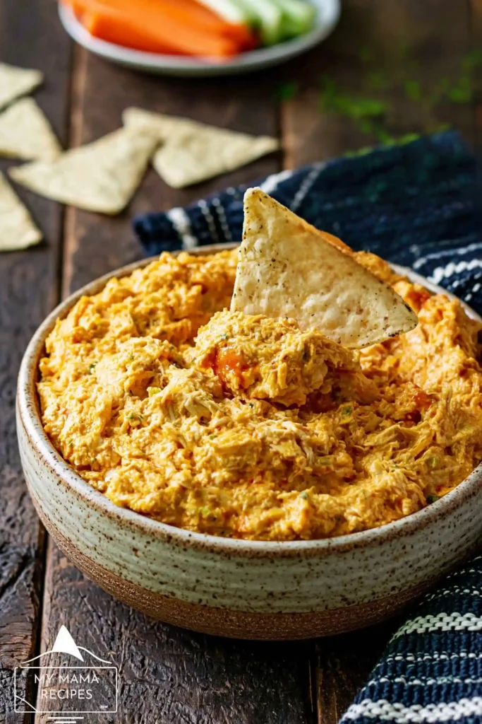 Crockpot Buffalo Chicken Dip That Stays Creamy for Every Gathering 6 Crockpot Buffalo Chicken Dip served with tortilla chips, carrots, and celery