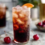Glass of Homemade Dr. Pepper on a modern kitchen counter