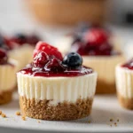 macro texture close-up of mini cheesecake with berry topping