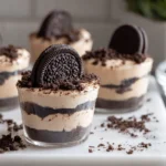 Photorealistic Mini Oreo Dessert Cups on modern kitchen counter