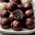 Photorealistic close-up of Oreo Balls dessert on plate in modern kitchen