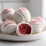 finished red velvet cake pops on plate in modern kitchen