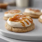 photorealistic salted caramel cheesecake cookies on plate in modern kitchen