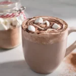 finished mug of semi-homemade hot chocolate mix styled on modern kitchen counter