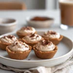 Photorealistic hero image of tiramisu cookie cups in a modern kitchen