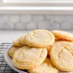 freshly baked vanilla sugar cookies on a modern kitchen counter with natural daylight