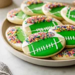 photorealistic hero shot of Football Stadium Sugar Cookies styled on modern plate