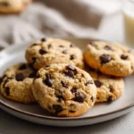 Hero shot of one cookie dough baked cookies on a modern plate