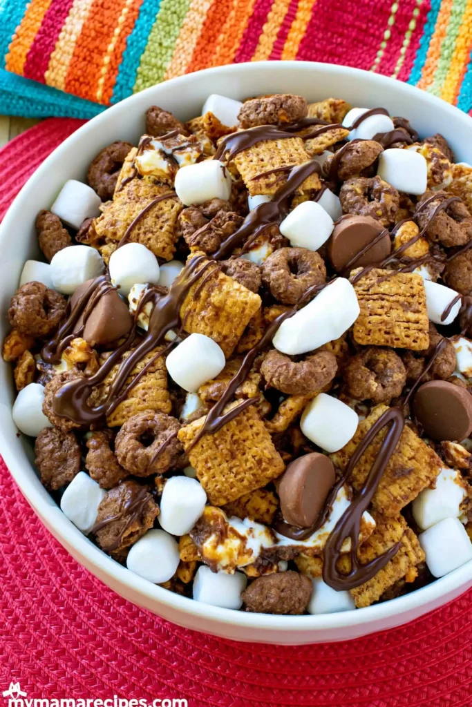 S’mores Snack Mix for an Easy No-Bake Treat 8 S’mores Snack Mix variation with mini pretzels and chocolate drizzle