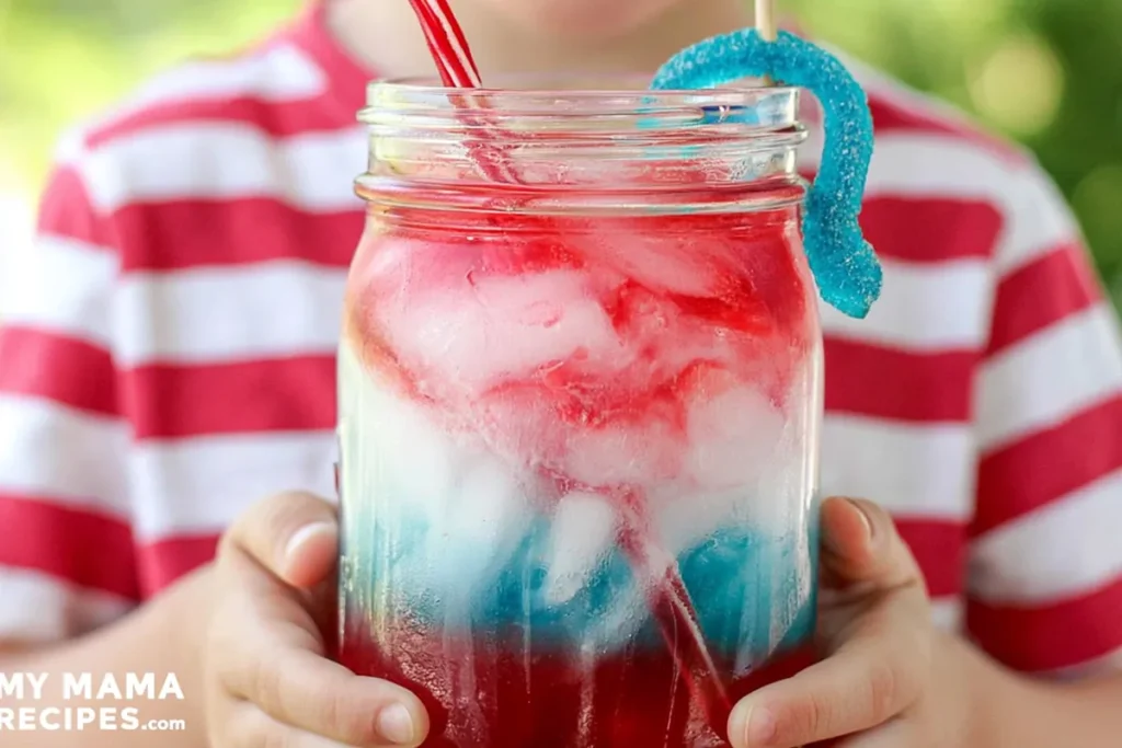 Patriotic punch with a Twizzlers candy straw and blue candy tie