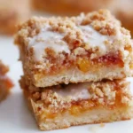 Mohamed Ayad's Peach Crumb Bars Recipe with buttery cinnamon crumb topping